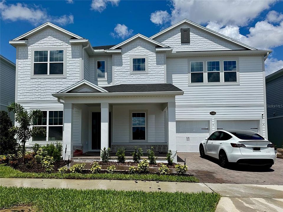Two-story gray home with a driveway in Winter Garden, Florida